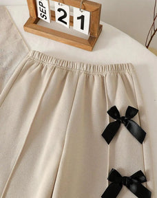Beige with Black Bow Printed Kids Winter Suit (7-14 Years)